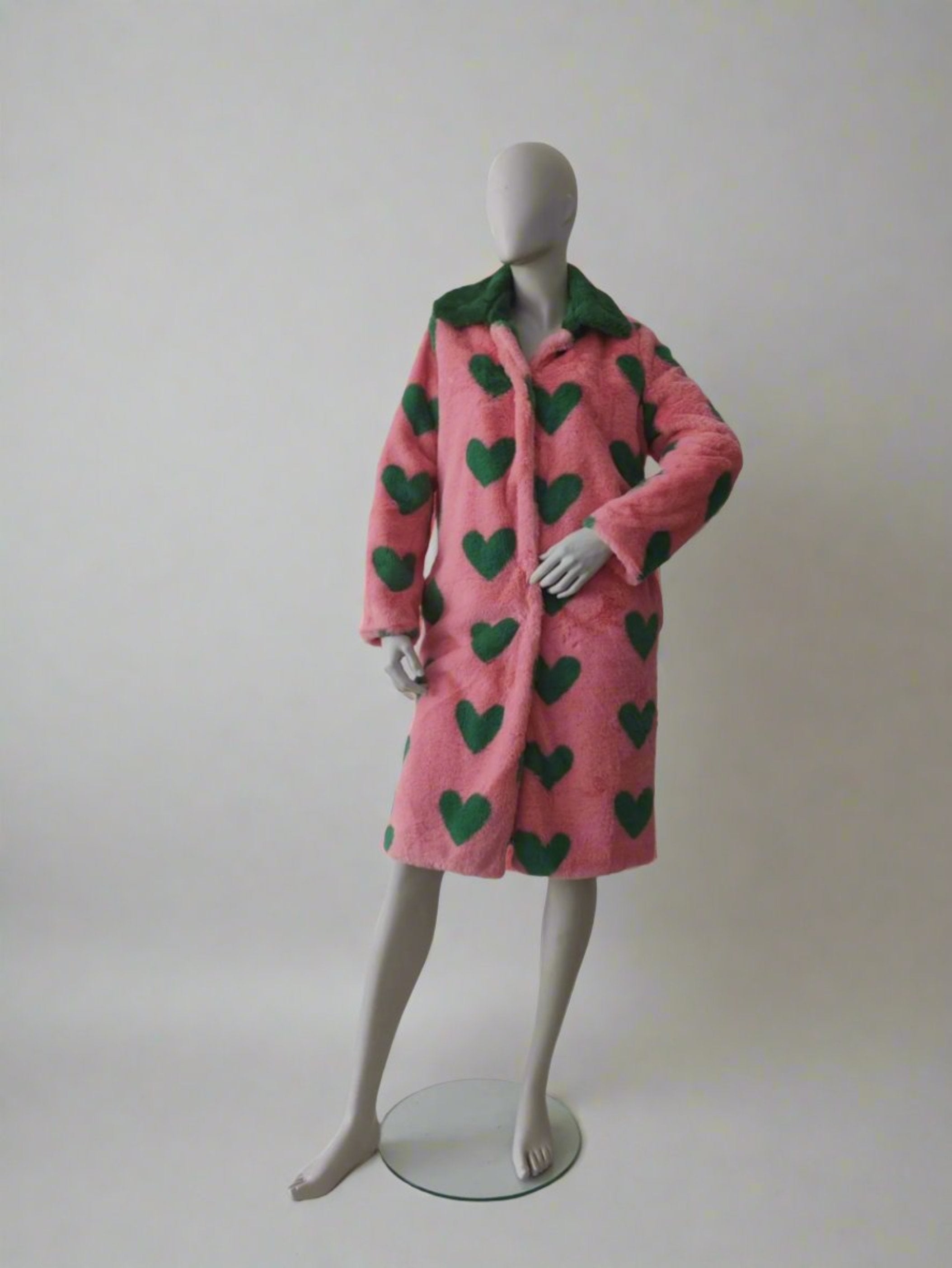 Pink fur coat with green hearts