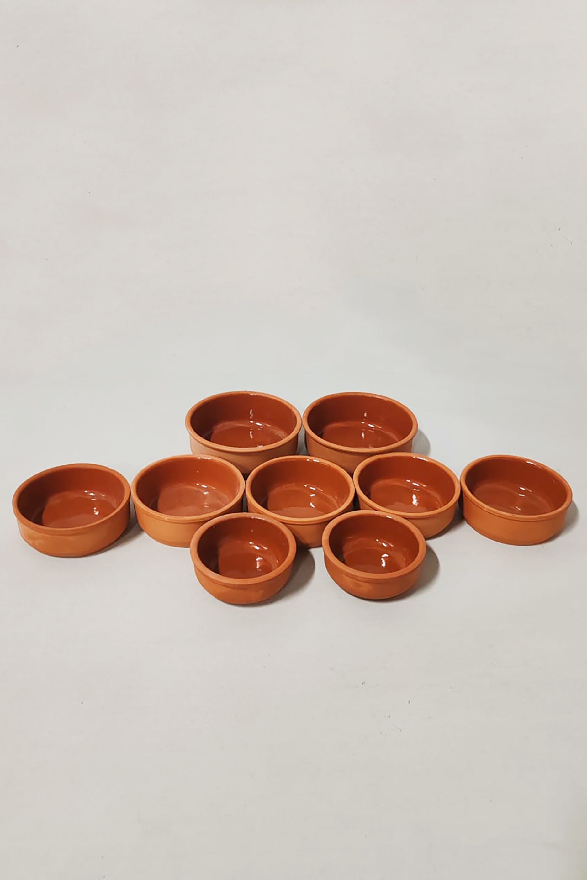 Terracotta serving dishes (set of 9)