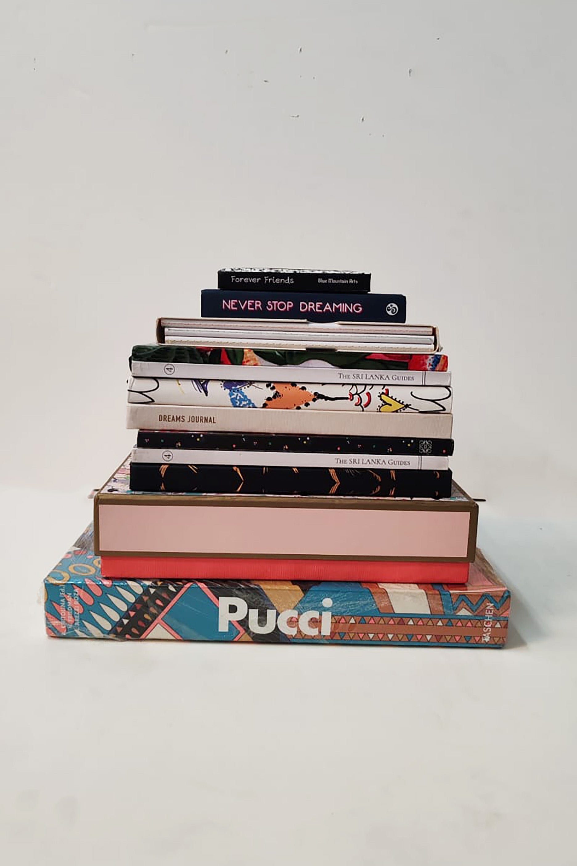 Stack of luxury fashion coffee table books