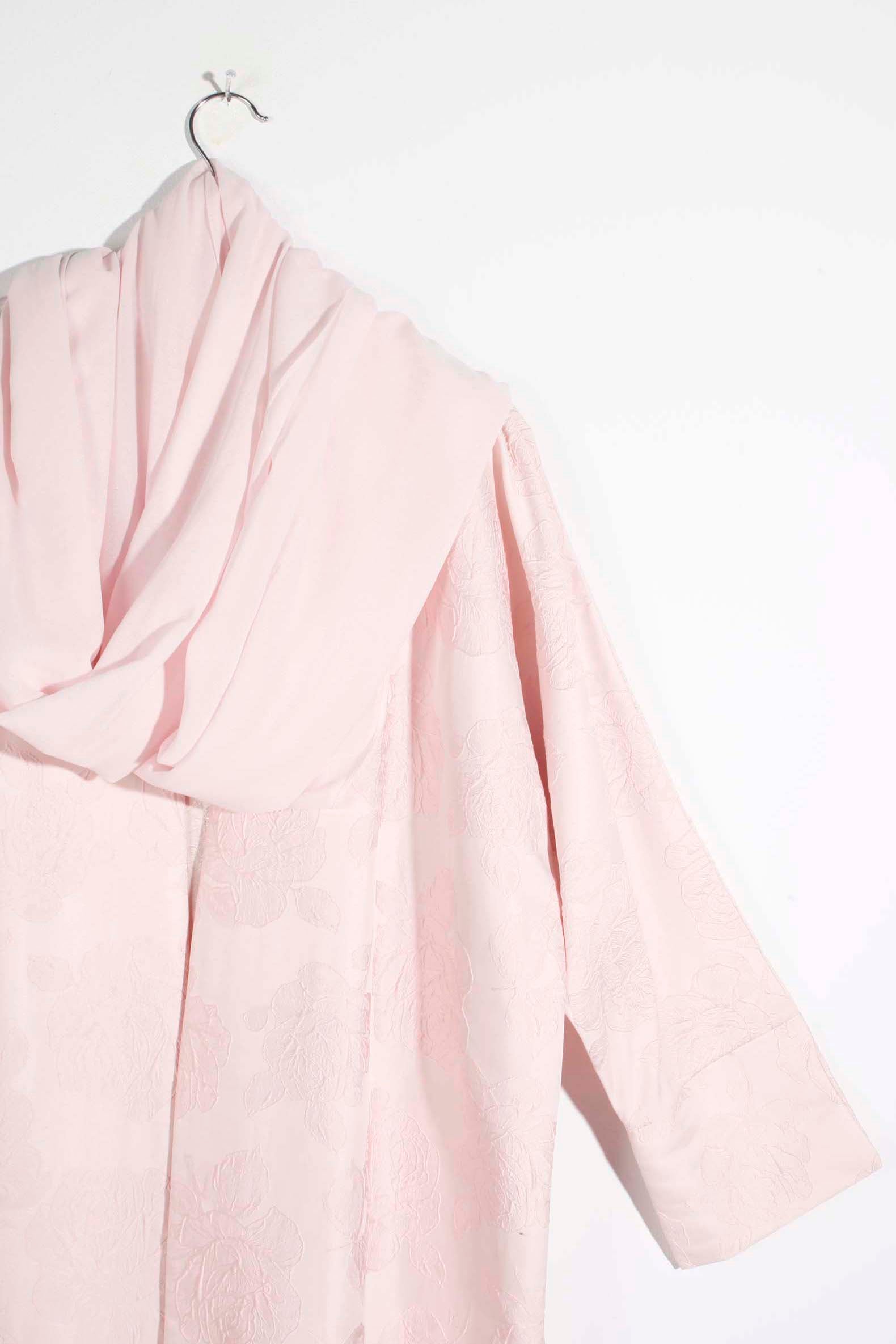 Pale pink abaya with floral pattern