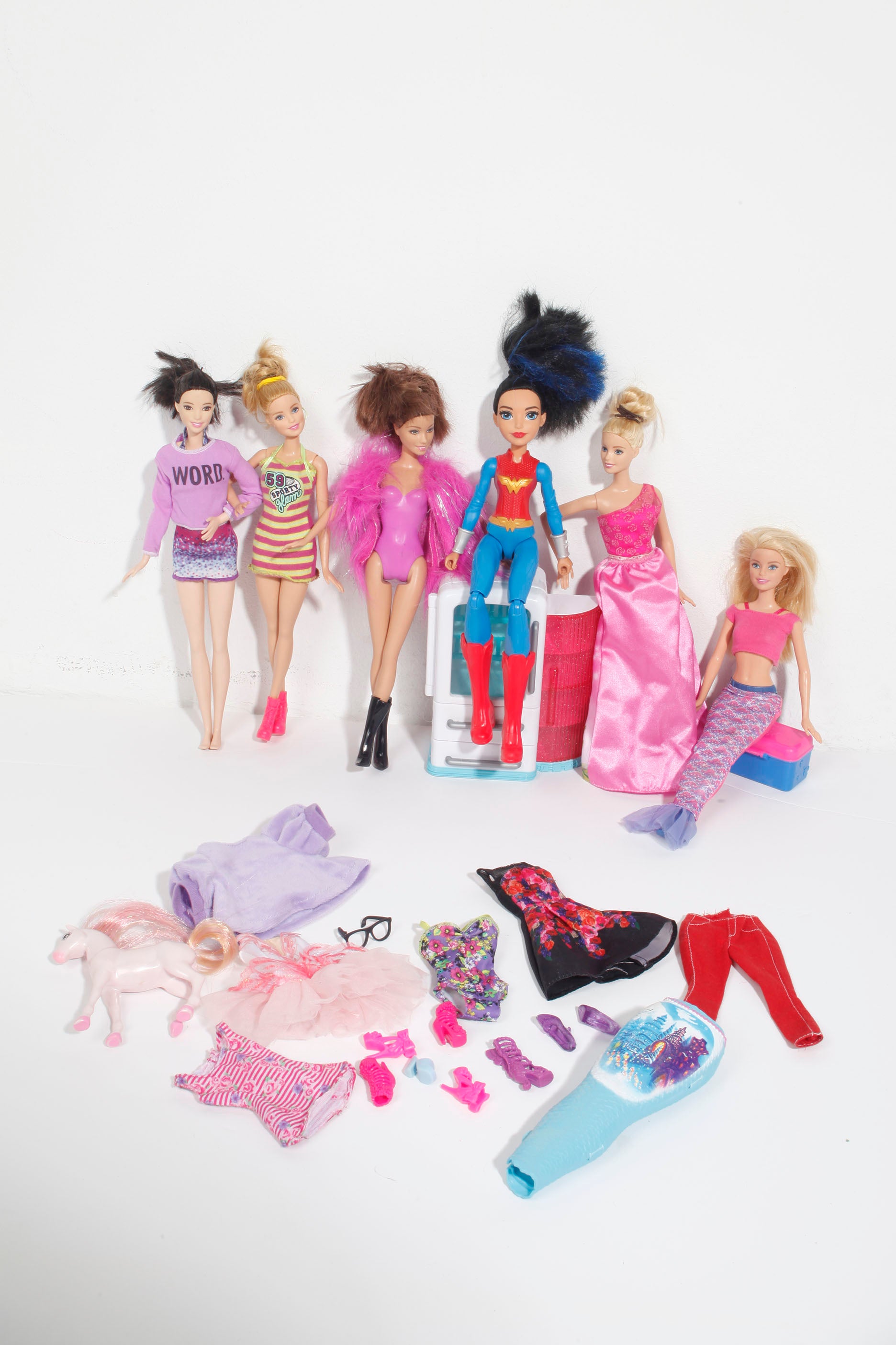 Bundle of Six Barbie Dolls and Fashion