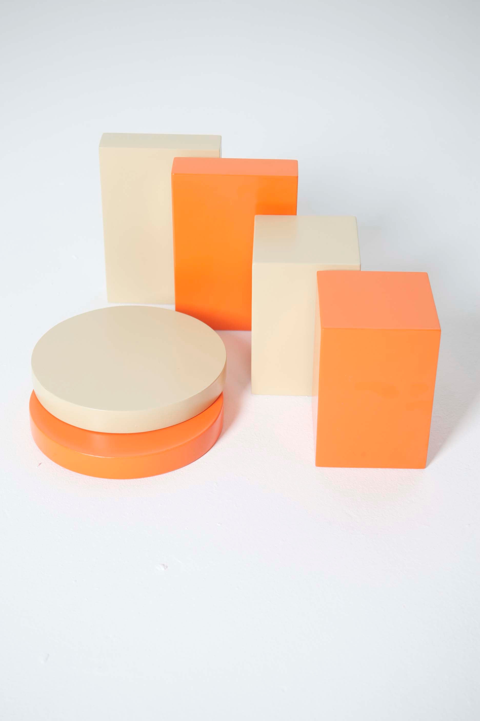 Bundle of Small Block and Cylinder Plinths in Orange / Beige