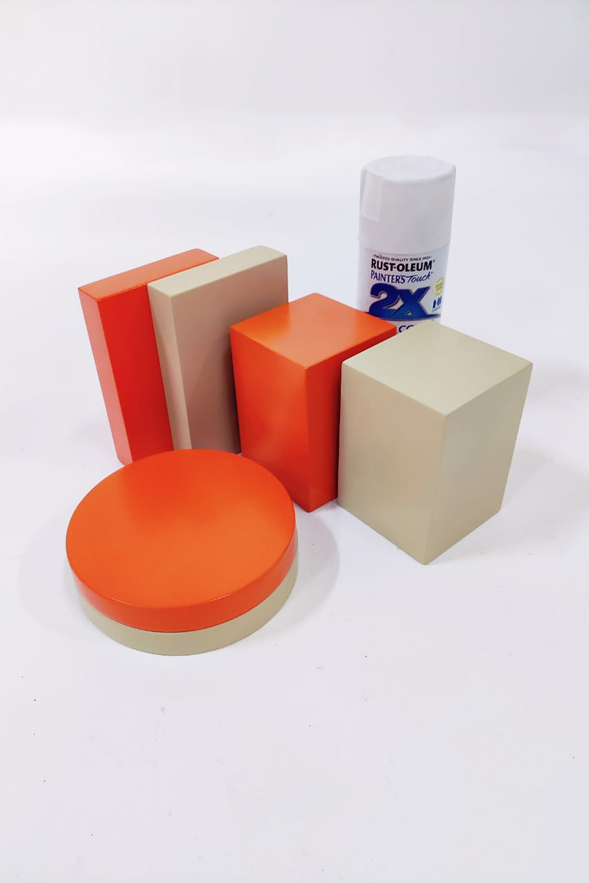 Bundle of Small Block and Cylinder Plinths in Orange / Beige